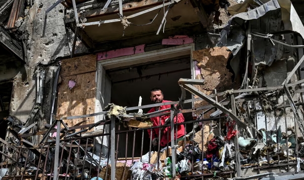Missile strikes on Ukrainian cities as call-up causes chaos in Russia